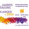 Plakat zur 31. Jahrestagung in Erlangen mit buntem Stadtpanorama